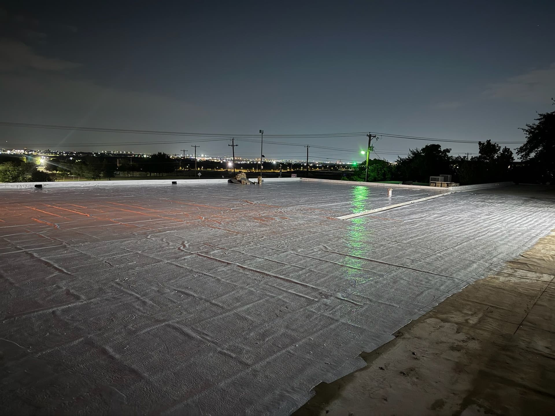 Silicone Roof Coating Brilliance at Night in Lake Worth image