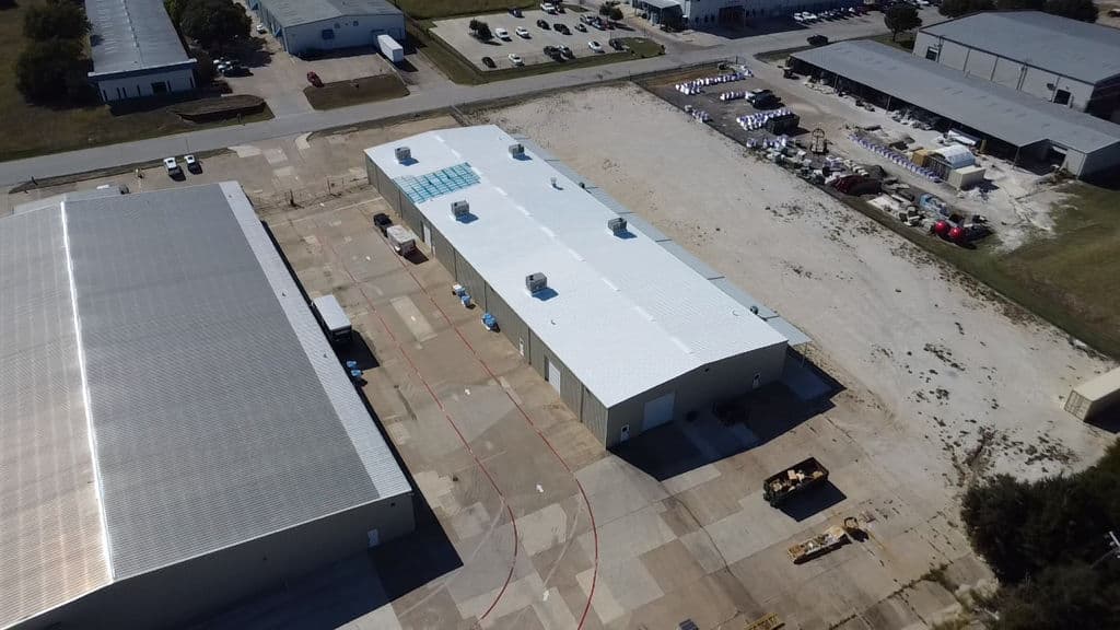 Massive Metal Roof Coating in Industrial Hub image
