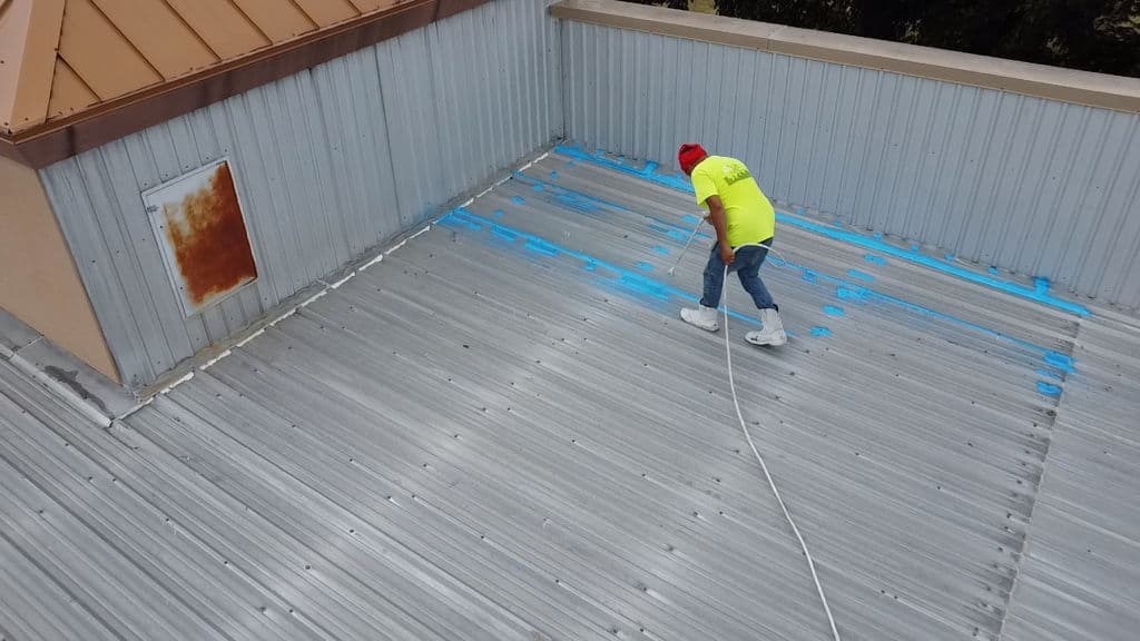 Enhanced Metal Roof Protection with Blue Sealant image